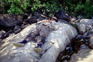 Jim tries to nap on a rock.
